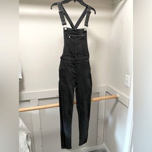 Divided women’s black denim overalls, size 4